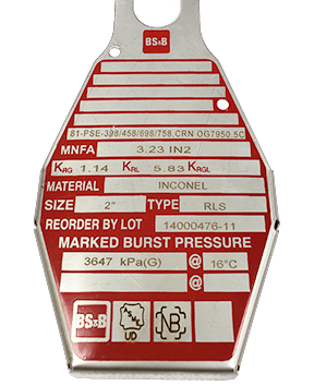 Close up rupture disk with ASME stamp on tag